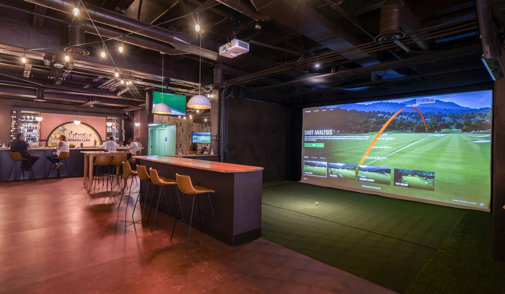 The Links Club bar and simulator bays in Carmel Plaza